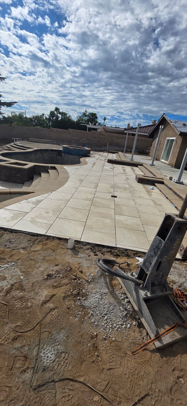 Elegant MSI Ivory Porcelain Paver Installation for a Backyard Pool in Upland image