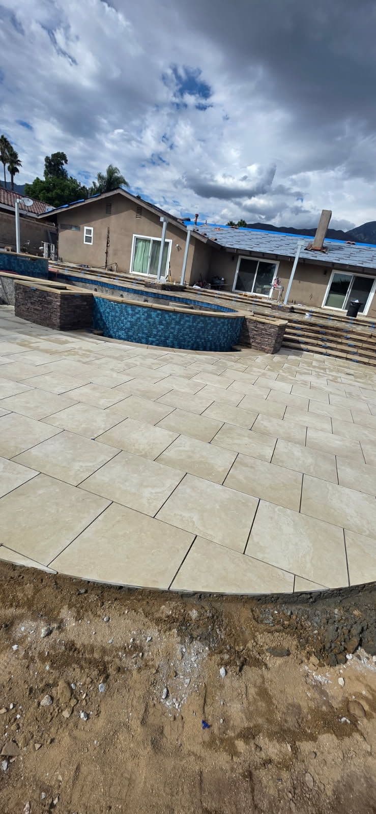 Gallery photos for Elegant MSI Ivory Porcelain Paver Installation for a Backyard Pool in Upland: Image #1