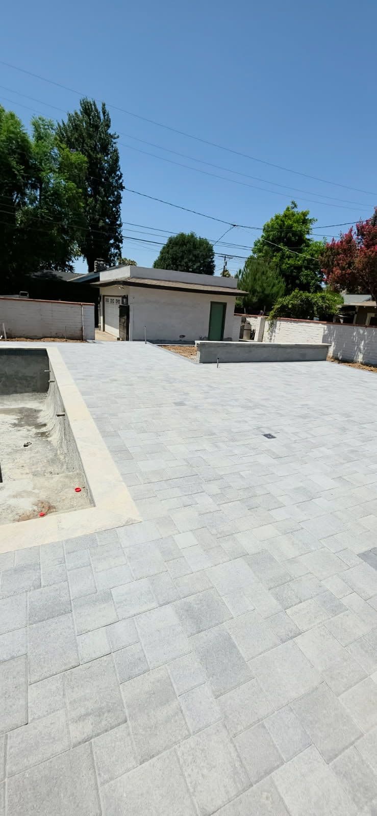 Sleek Gray Patio and Pool Deck Installation image